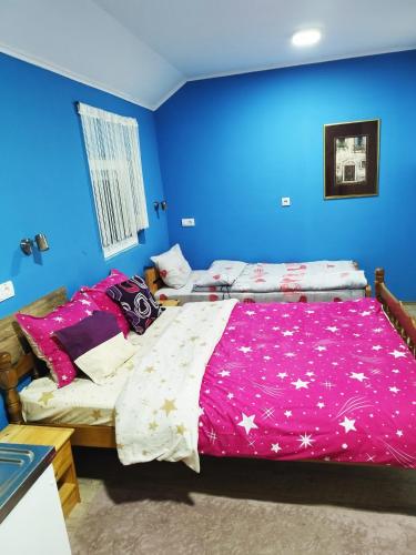 Ein Bett oder Betten in einem Zimmer der Unterkunft Soba Milica