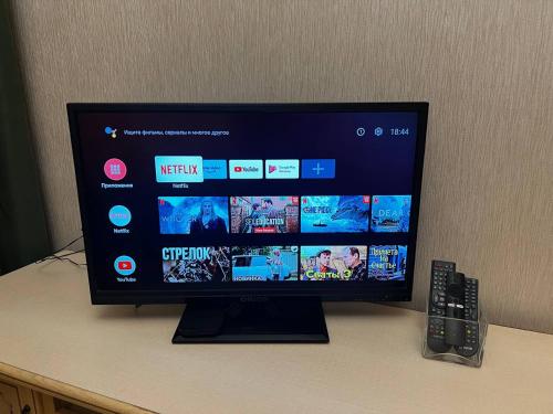 Μια τηλεόραση ή/και κέντρο ψυχαγωγίας στο Apartment Baseina Khreschatyk