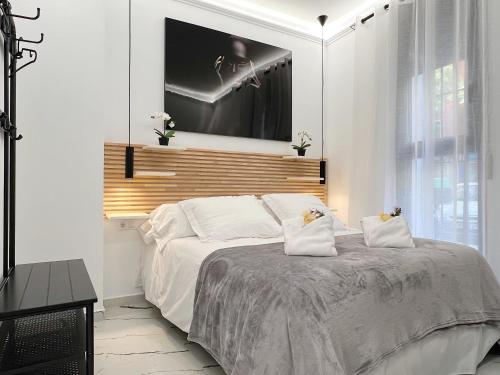 Ένα ή περισσότερα κρεβάτια σε δωμάτιο στο Apartamento en la Gran Manzana