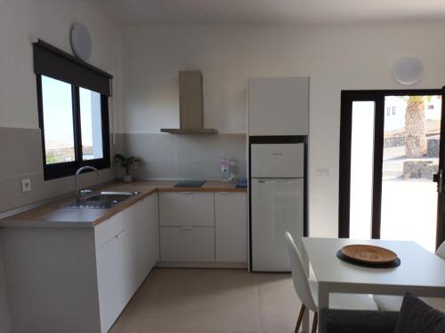 Dapur atau dapur kecil di Apartamentos Falcón