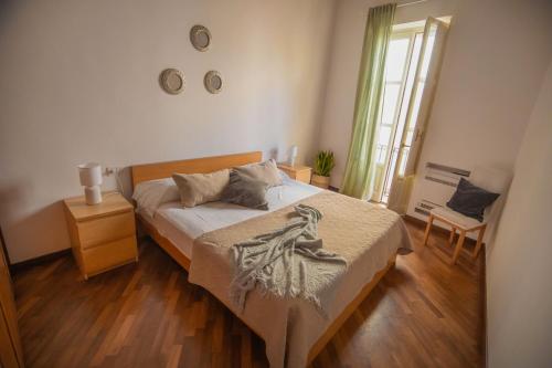 Katil atau katil-katil dalam bilik di Anacreonte Ortigia Apartment