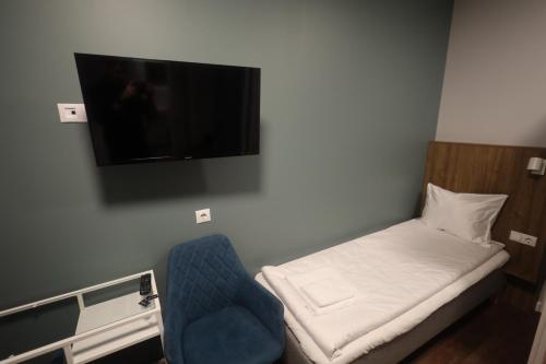 Letto o letti in una camera di Stay Vilnius Hotel