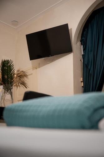 Raphael Temporary Home in Urbinoにあるテレビまたはエンターテインメントセンター