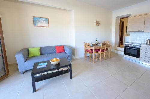 Kuchyň nebo kuchyňský kout v ubytování Pangolas Apartments Paxos