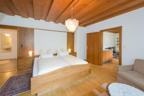 מיטה או מיטות בחדר ב-Landhaus Tritscher