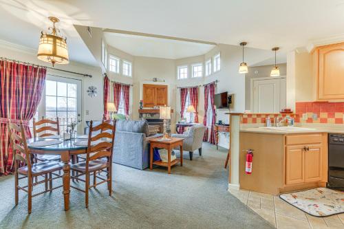 a kitchen and living room with a table and chairs at Spacious Condo with View Less Than 1 Mi to Mtn Creek Resort! in Vernon Township