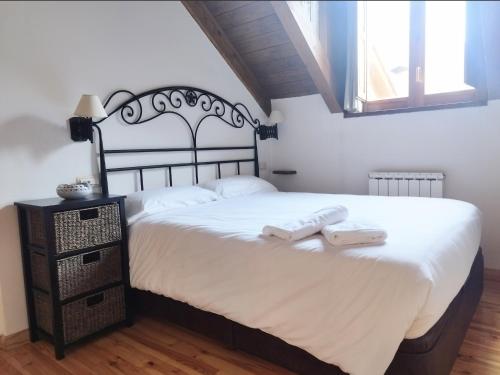 Postel nebo postele na pokoji v ubytování CHECK-IN CASAS Casa Puntarron