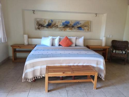 Ένα ή περισσότερα κρεβάτια σε δωμάτιο στο Tripui Hotel