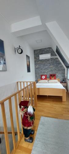 Postel nebo postele na pokoji v ubytování Aprtman Divčigora C14