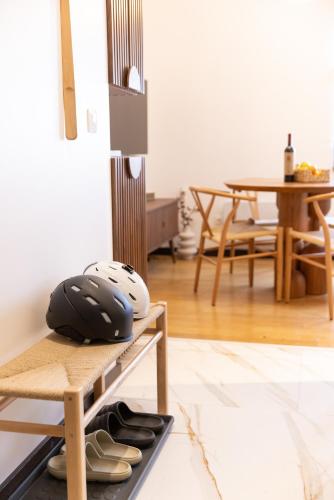 a group of shoes sitting on a shelf in a room at Glečer Kop, Cozy design apartment A5, FREE Parking Garage in Kopaonik