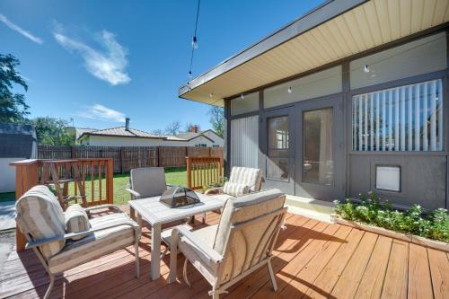 a patio with a table and chairs on a deck at Pet-Friendly Brady Vacation Home Near Wineries! in Brady