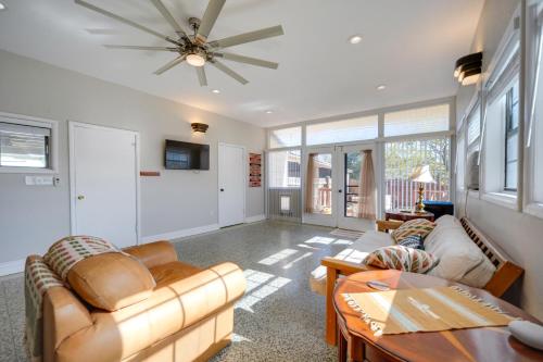a living room with couches and a ceiling fan at Pet-Friendly Brady Vacation Home Near Wineries! in Brady