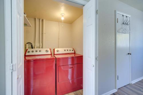 a red washer and dryer in a room at Pet-Friendly Brady Vacation Home Near Wineries! in Brady