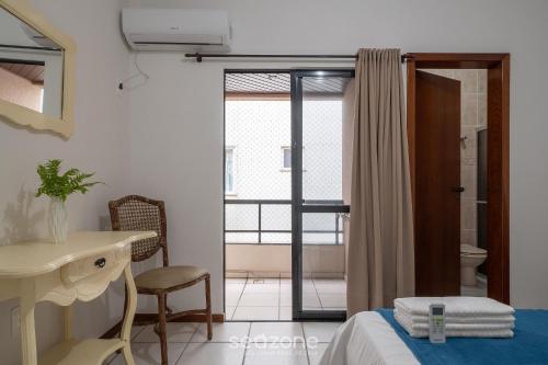 Ένα ή περισσότερα κρεβάτια σε δωμάτιο στο Apto 3Q à beira-mar c/ churrasqueira RSL0502