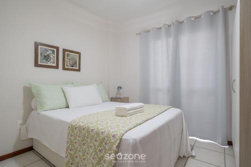Ένα ή περισσότερα κρεβάτια σε δωμάτιο στο Apto 3Q à beira-mar c/ churrasqueira RSL0502