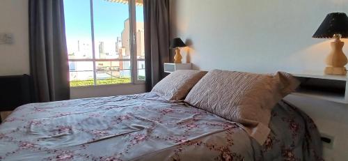 Postel nebo postele na pokoji v ubytování DEPARTAMENTOS SAAVEDRA dto 3 y 4