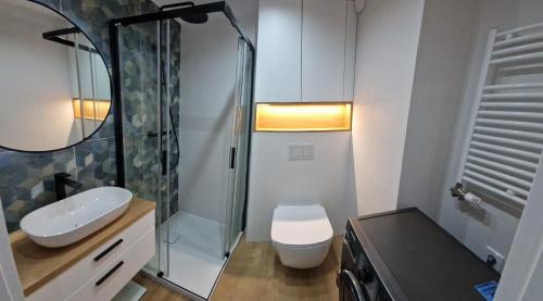 Ένα μπάνιο στο Apartament Sunray