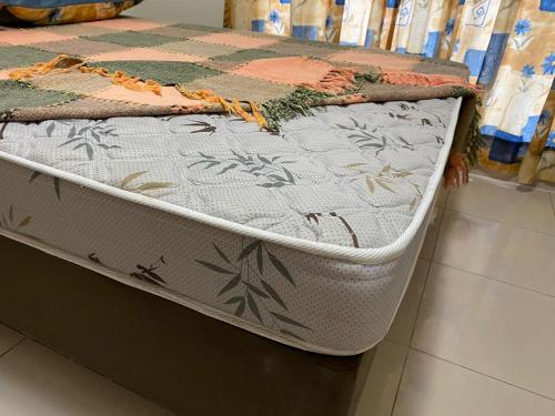 a mattress sitting on the floor in a room at Casa do Jardim in Curitiba