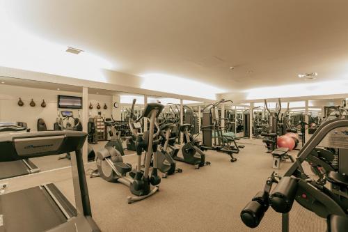 a gym with lots of treadmills and machines at Rosewood Cape Kidnappers in Te Awanga