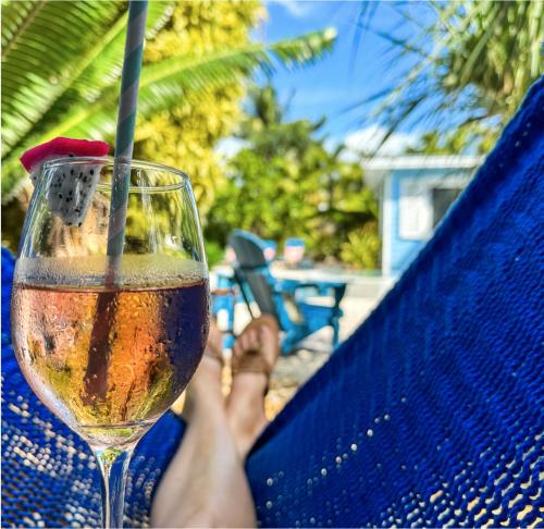a person is holding a glass of wine at Captain's Quarters Marathon in Marathon