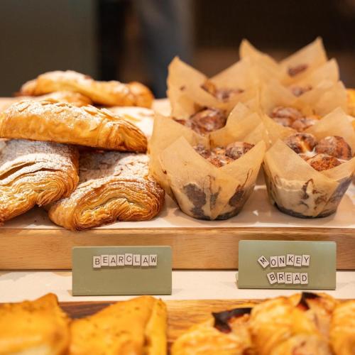 a display of different types of breads and pastries at Summit Lofts Boutique Hotel in Mount Shasta