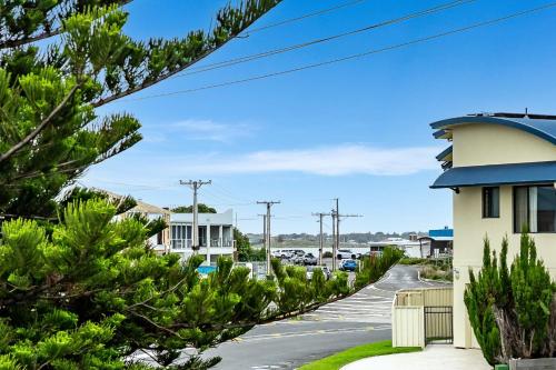 a street in a residential neighborhood with trees at Tee and Tide Retreat - Linen Included in Goolwa South