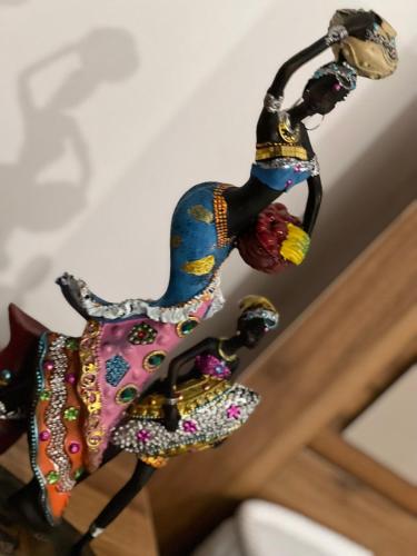 a figurine of a horse on a table at sea esta in Mount Lavinia