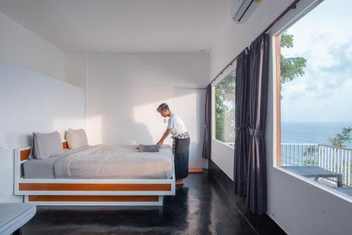 En eller flere senge i et værelse på Nunggalan Octopus 1