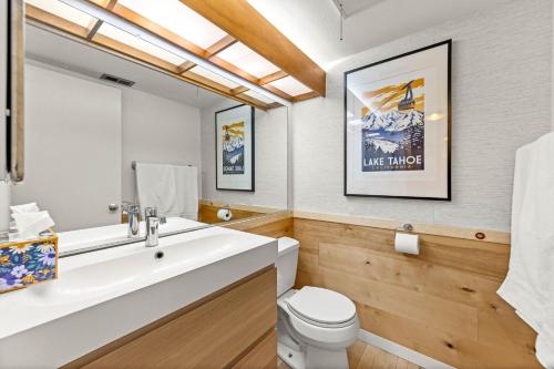 a bathroom with a white sink and a toilet at Carnelian Woods # 59 - 2 BR Carnelian Bay Retreat - Minutes to Lake w HOA Amenities in Carnelian Bay