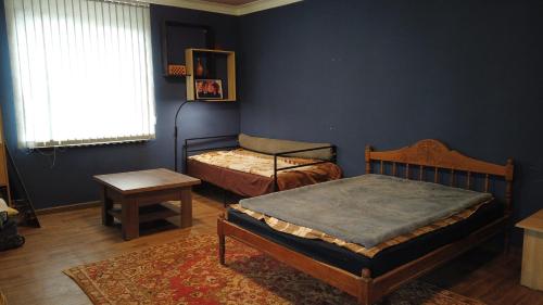 Ένα ή περισσότερα κρεβάτια σε δωμάτιο στο Large, Pet-Friendly Home in Kalavan