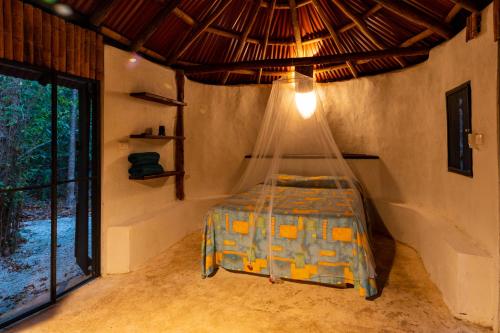 Posteľ alebo postele v izbe v ubytovaní Villa Maya - Glamping - Natural Reserve