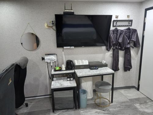 TV o dispositivi per l'intrattenimento presso On & Off Hotel Bupyeong