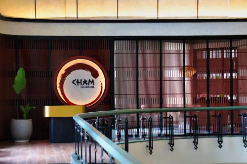 a restaurant with a sign that says sharma on the wall at Melia Hanoi in Hanoi