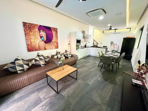 a living room with a couch and a table at Huge Luxury, 3 Bedroom, private pool villa near to the beach - Jomtien - LV99 in Jomtien Beach