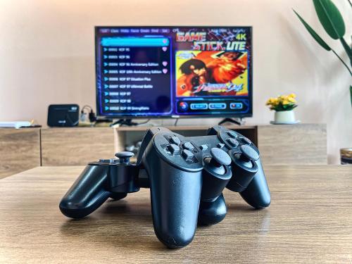 a couple of video game controllers sitting on a table at PoolView Waterpark 300Mbps Ipoh Homestay Manhattan Condo 4-7pax 3bedroom Station 18 pengkalan in Ipoh