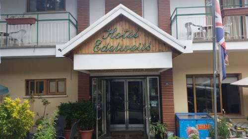 
a building with a sign on the front of it at Edelweiss Hotel in Platres
