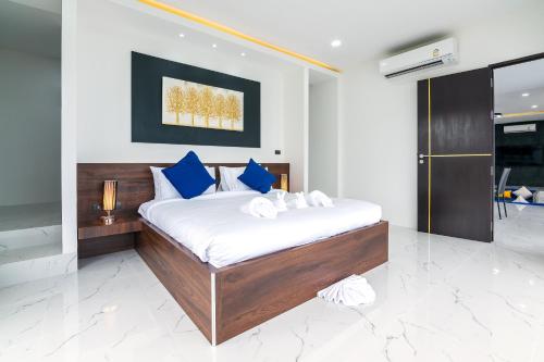 Ένα ή περισσότερα κρεβάτια σε δωμάτιο στο Mango Hill Residence
