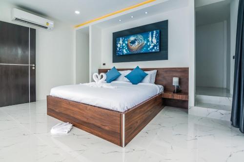 Ένα ή περισσότερα κρεβάτια σε δωμάτιο στο Mango Hill Residence