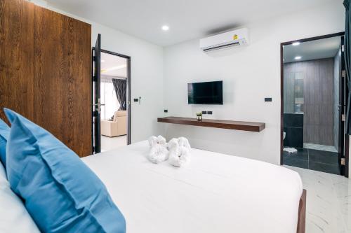 Μια τηλεόραση ή/και κέντρο ψυχαγωγίας στο Mango Hill Residence
