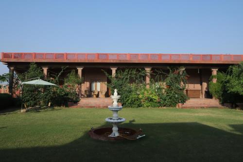 a fountain in the yard of a house at Kot Dunara - A 16th Century Castle near Jodhpur in Jodhpur