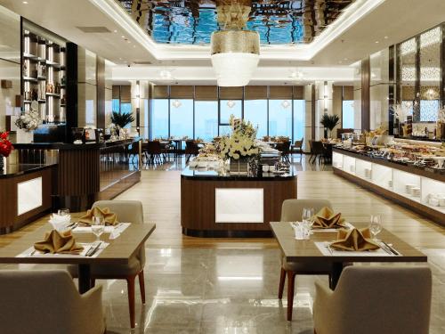 A restaurant or other place to eat at Grand K Hotel Suites Hanoi