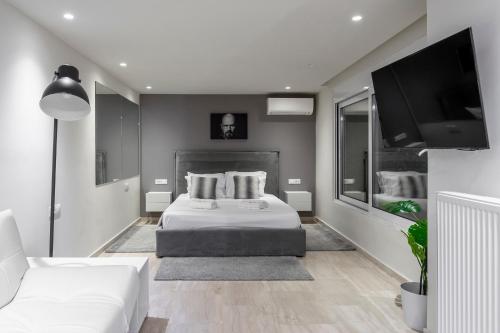 Voodi või voodid majutusasutuse Mayer Hellas 2Br Duplex Kolonaki Apartment toas