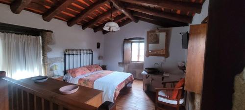 Postel nebo postele na pokoji v ubytování Casas Quo Vadis- Naranja