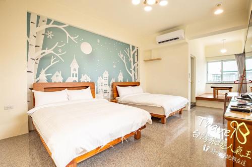 Cama o camas de una habitación en 還早文旅