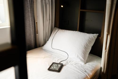 Ein Bett oder Betten in einem Zimmer der Unterkunft Haka House Franz Josef