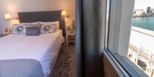 Ένα ή περισσότερα κρεβάτια σε δωμάτιο στο Phoenix Luxury Loft Cádiz