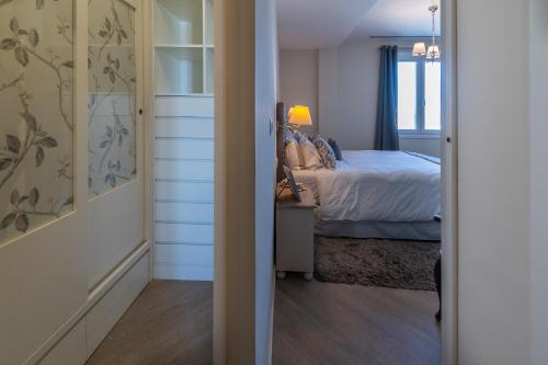 Ένα ή περισσότερα κρεβάτια σε δωμάτιο στο Phoenix Luxury Loft Cádiz