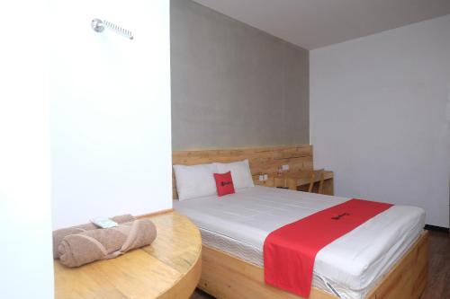Postel nebo postele na pokoji v ubytování RedDoorz @ Klaten City