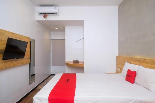 Postel nebo postele na pokoji v ubytování RedDoorz @ Klaten City