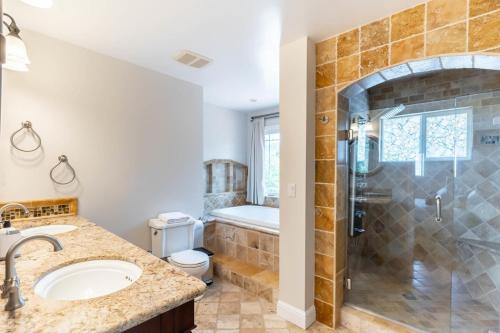 a bathroom with a shower and a toilet and a sink at Los Gatos 5br w backyard nr trails wineries SFO-1614 in Los Gatos